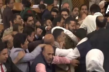 Ruckus in the assembly over the poster of Article 370… अनुच्छेद 370 के पोस्टर पर विधानसभा में बवाल, विधायकों के एक-दूसरे कालर पकड़े